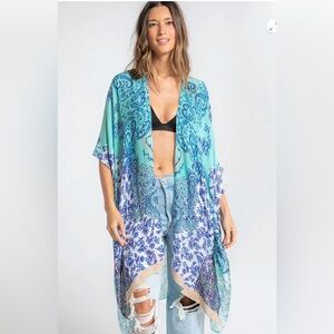 Love stitch light weight Kimono, also a great beach cover up:). O/S fits all.🦋🦋